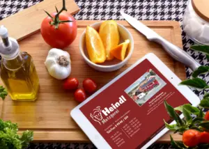 Webseite von Metzgerei Heindl auf einem Tablet