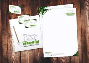 Briefpapier und Visitenkarten mit Logo von Michael Obermeier, Landmaschinenwerkstatt