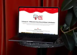 Webseite von Wiesenfeldener Volkstheater e. V. auf einem Laptop