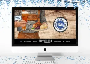 Webseite von Zipperer B auf einem Monitor